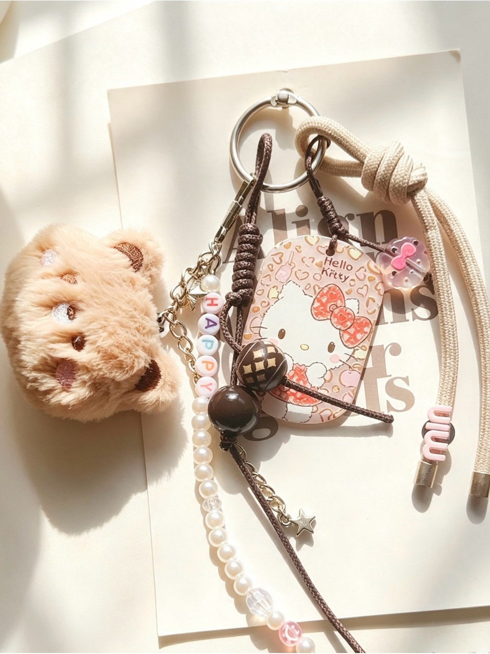 La Cornue Miu-inspired Bag Charm Set with Fuzzy Bear, Hello Kitty & Happy charm